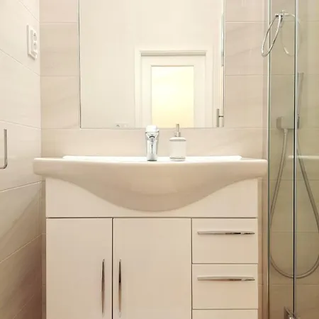 Beige Bed Apartment Bratislava